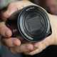 Image for article titled Sony QX1: A Weird Interchageable-Lens Camera You Strap to Your Phone